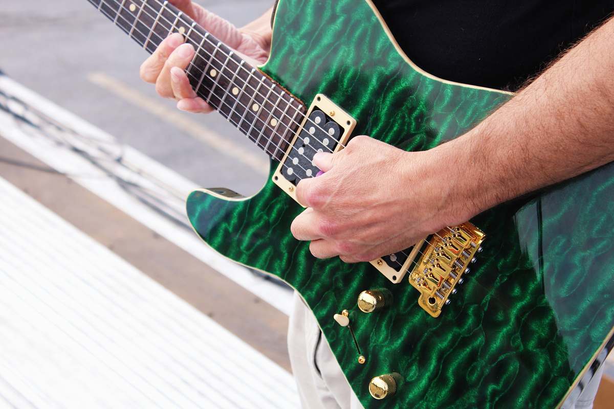 guitar person playing electric guitar leisure activities